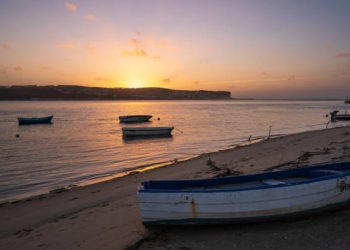 image00019 Foz do Arelho, Portugal - November 26, 2018 : Fishing boats on a river sea at sunset in Foz do Arelho, Portugal